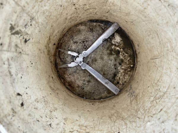 Multi-tool pliers found inside a bucket